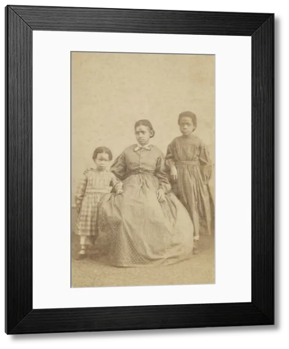 Framed Print : Carte-de-visite of a young woman and two children, 1864 - 1866 Framed Print : Carte-de-visite of a young woman and two children, 1864 - 1866