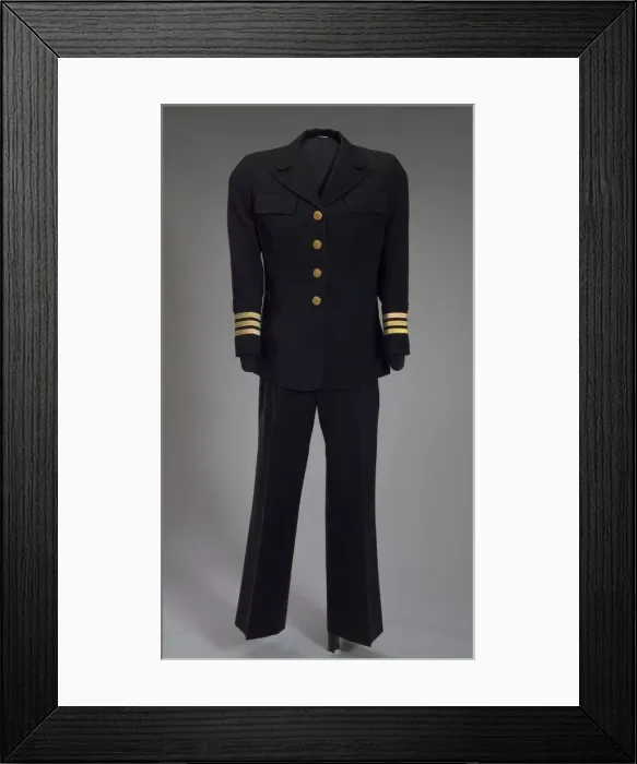Framed Print : US Navy dress uniform jacket worn by Admiral Michelle Howard, 1999. Creator: Unknown
