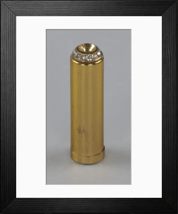 Framed Print : Metal lipstick holder from Maes Millinery Shop, 1941-1994. Creator: Unknown Framed Print : Metal lipstick holder from Maes Millinery Shop, 1941-1994. Creator: Unknown