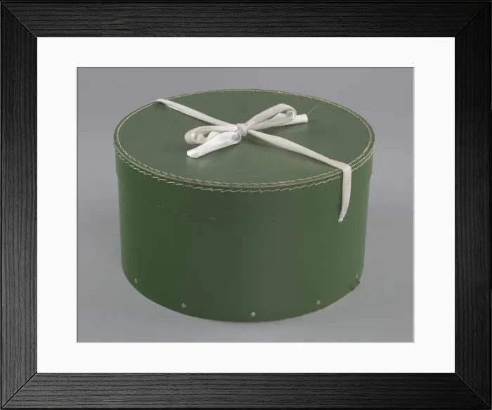 Framed Print : Green circular hatbox with lid from Maes Millinery Shop, 1941-1994. Creator: Unknown Framed Print : Green circular hatbox with lid from Maes Millinery Shop, 1941-1994. Creator: Unknown