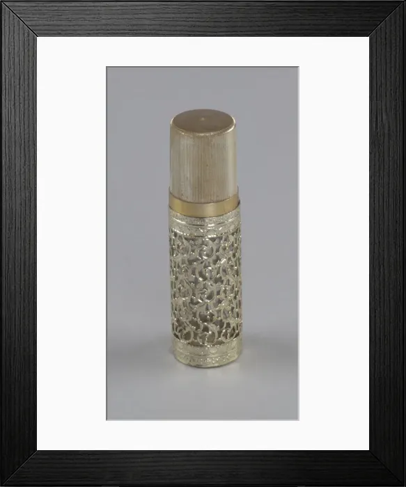 Framed Print : Gold and glass perfume bottle from Maes Millinery Shop, 1941-1994. Creator: Anne Paree Framed Print : Gold and glass perfume bottle from Maes Millinery Shop, 1941-1994. Creator: Anne Paree