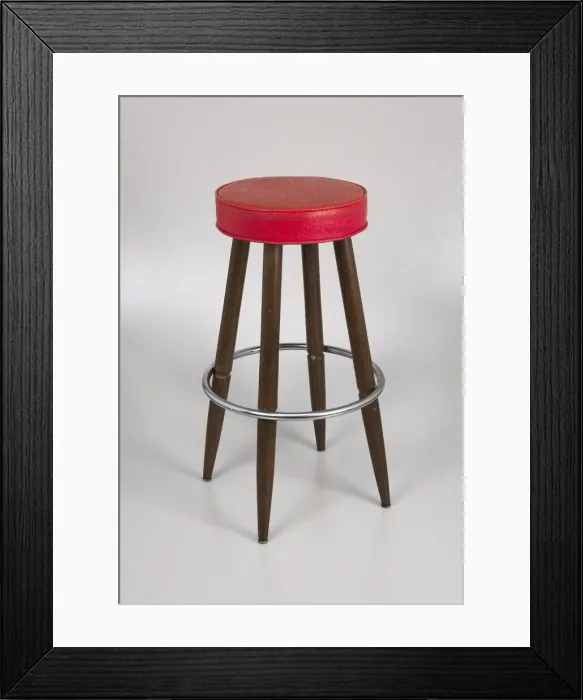 Framed Print : Barstool with red vinyl cover from Muse Bar, the home bar of Isaiah Muse, 1970s Framed Print : Barstool with red vinyl cover from Muse Bar, the home bar of Isaiah Muse, 1970s