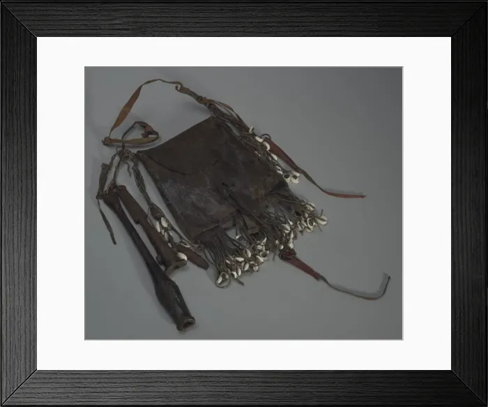 Framed Print : Leather bag with tools, whistles, and shells, 20th Century. Creator: Unknown Framed Print : Leather bag with tools, whistles, and shells, 20th Century. Creator: Unknown