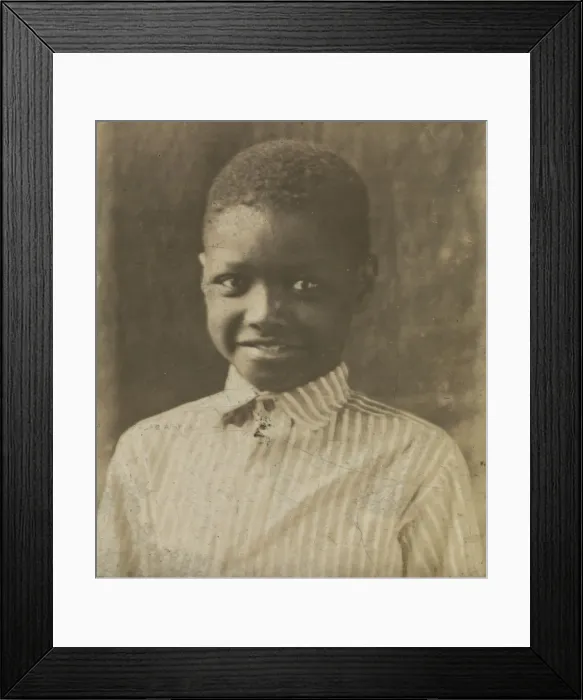 Framed Print : Photographic print of a young boy, early 20th century. Creator: Unknown Framed Print : Photographic print of a young boy, early 20th century. Creator: Unknown