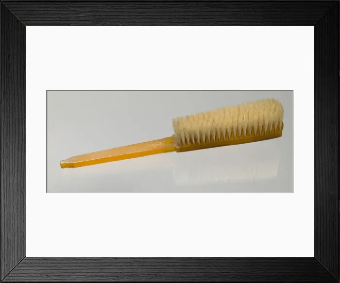 Framed Print : Bakelite clothes brush from dresser set owned by Lena Horne, mid 20th Century Framed Print : Bakelite clothes brush from dresser set owned by Lena Horne, mid 20th Century