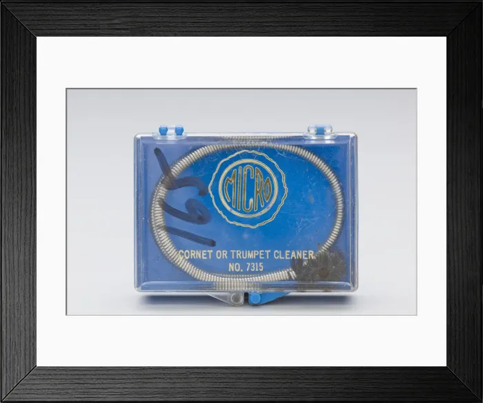 Framed Print : Instrument cleaning snake and case belonging to Maxine Sullivan, ca. 1936 Framed Print : Instrument cleaning snake and case belonging to Maxine Sullivan, ca. 1936