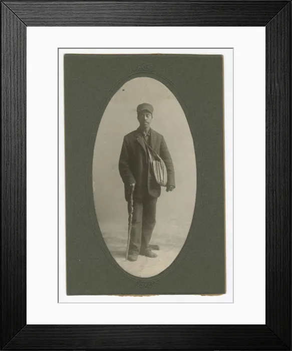 Framed Print : Cabinet card of a newspaper carrier, mid to late 19th century. Creator: Unknown Framed Print : Cabinet card of a newspaper carrier, mid to late 19th century. Creator: Unknown