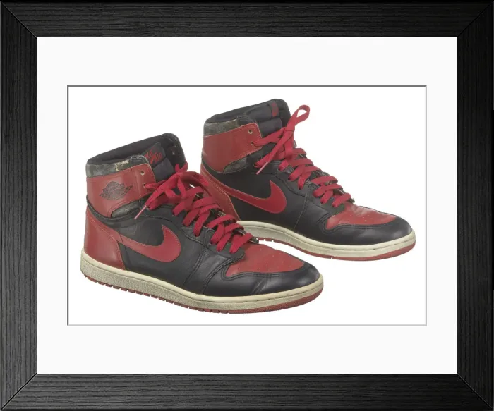 Framed Print : Pair of red and black Air Jordan I high top sneakers made by Nike, 1985. Creator: Nike Framed Print : Pair of red and black Air Jordan I high top sneakers made by Nike, 1985. Creator: Nike