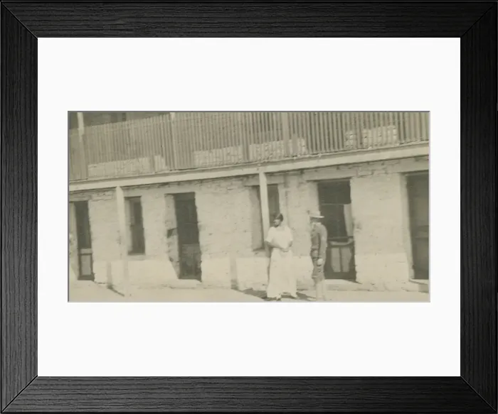 Framed Print : Photograph of a man and woman standing on a sidewalk, early 20th century Framed Print : Photograph of a man and woman standing on a sidewalk, early 20th century