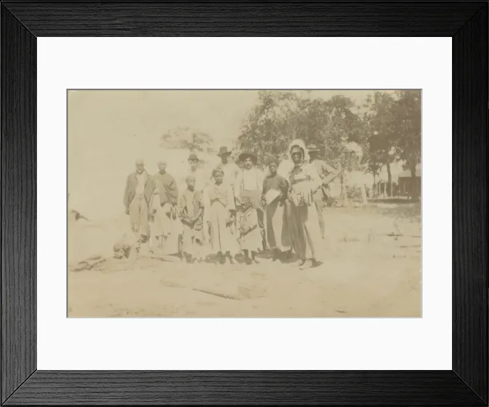 Framed Print : Photograph of men, women, and children in a yard, early 20th century. Creator: Unknown Framed Print : Photograph of men, women, and children in a yard, early 20th century. Creator: Unknown