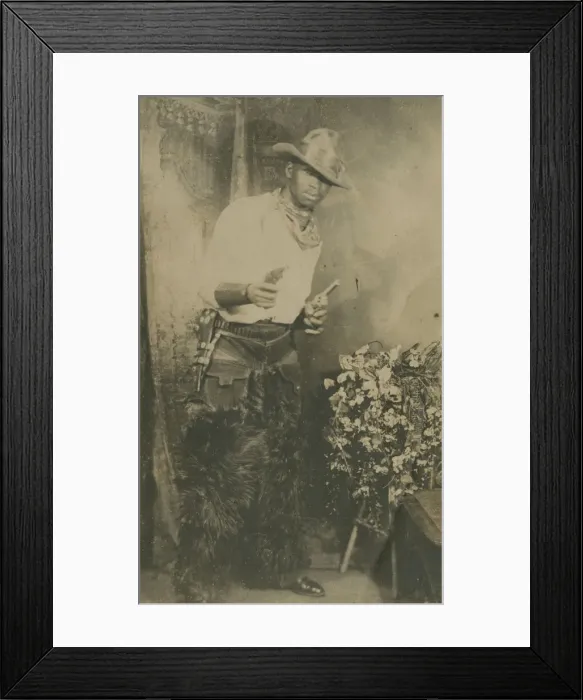 Framed Print : Photograph portrait of a man dressed as a cowboy, early 20th century. Creator: Unknown Framed Print : Photograph portrait of a man dressed as a cowboy, early 20th century. Creator: Unknown