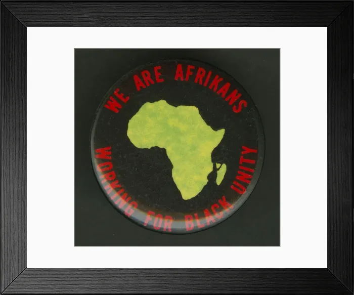 Framed Print : Pinback button promoting black unity, mid 20th century. Creator: Unknown Framed Print : Pinback button promoting black unity, mid 20th century. Creator: Unknown