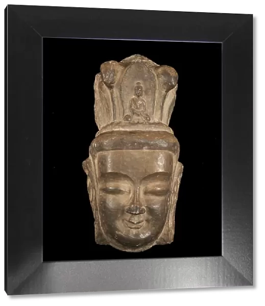 Head of Bodhisattva in high relief, with high headdress... Period of Division, 386-535