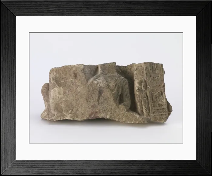 Framed Print : Fragment, showing torso of seated Buddha... Period of Division, ca. 500 Framed Print : Fragment, showing torso of seated Buddha... Period of Division, ca. 500