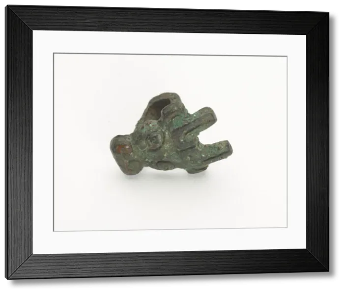 Framed Print : Ornament in the form of an animal mask, Zhou dynasty, ca. 1050-221 BCE. Creator: Unknown Framed Print : Ornament in the form of an animal mask, Zhou dynasty, ca. 1050-221 BCE. Creator: Unknown