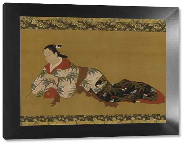 Yujo reclining and reading a musical score, Edo period, 1615-1868. Creator: Unknown