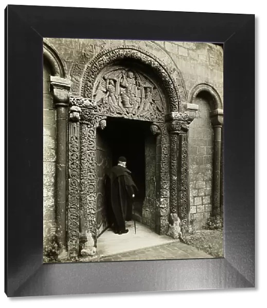 Ely Cathedral: Priors Door, with Bedesman, 1891. Creator: Frederick Henry Evans