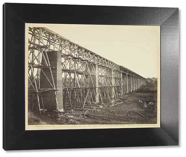 High Bridge Crossing the Appomattox, Near Farmville, 1865. Creator: Alexander Gardner