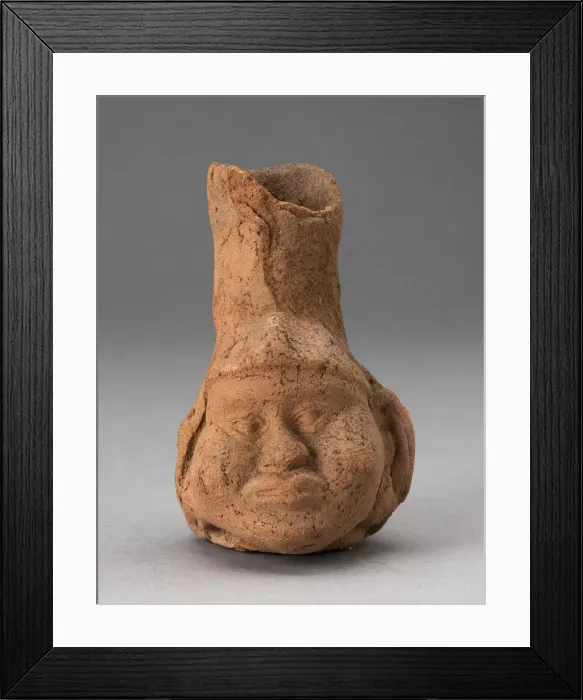 Framed Print : Heavily Eroded Miniature Jar in Form of a Human Head with Large Cheeks, 100 B. C. / A. D. 500 Framed Print : Heavily Eroded Miniature Jar in Form of a Human Head with Large Cheeks, 100 B. C. / A. D. 500