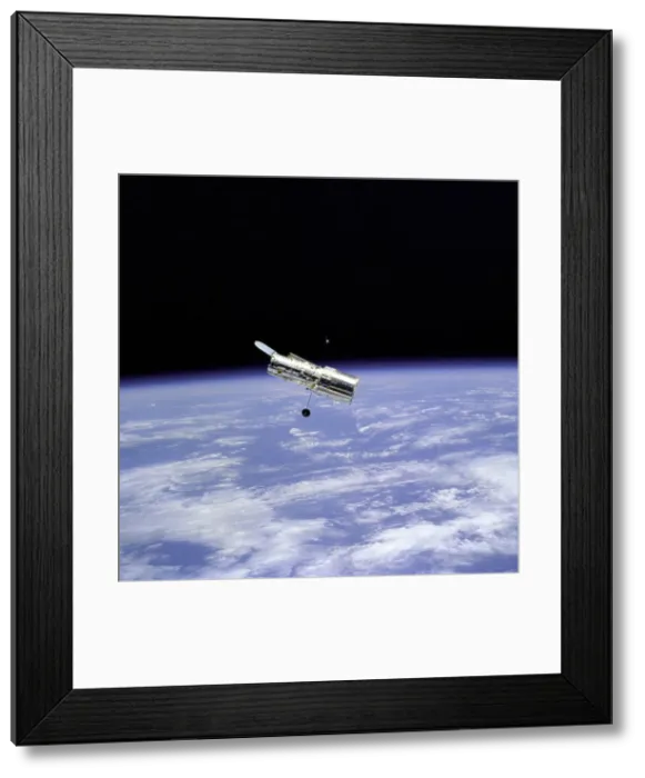 Framed Print : Hubble Space Telescope and Earth Limb, 1997. Creator: NASA Framed Print : Hubble Space Telescope and Earth Limb, 1997. Creator: NASA