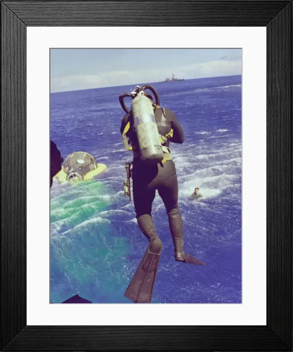 Framed Print : Navy diver leaps from helicopter, 1965. Creator: NASA Framed Print : Navy diver leaps from helicopter, 1965. Creator: NASA