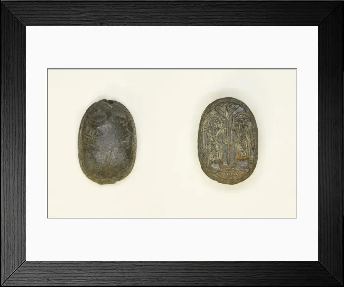Framed Print : Scaraboid: Face Motif on Top; Two Figures Holding Flower on Base, Egypt Framed Print : Scaraboid: Face Motif on Top; Two Figures Holding Flower on Base, Egypt