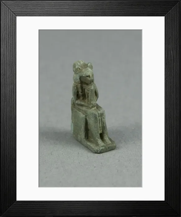 Framed Print : Amulet of a Seated Lion-headed Goddess Holding a Sistrum, possibly Bastet, Egypt, Third Framed Print : Amulet of a Seated Lion-headed Goddess Holding a Sistrum, possibly Bastet, Egypt, Third