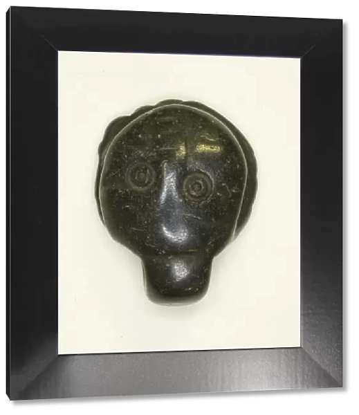 Face Amulet, Egypt, Coptic Period (4th-7th century AD). Creator: Unknown