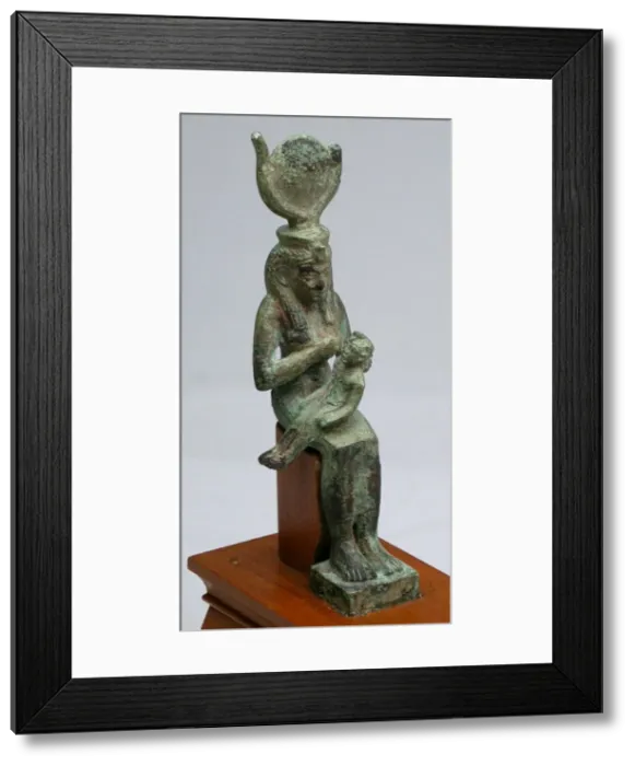 Framed Print : Statuette of the Goddess Isis Holding the God Horus, Egypt Framed Print : Statuette of the Goddess Isis Holding the God Horus, Egypt