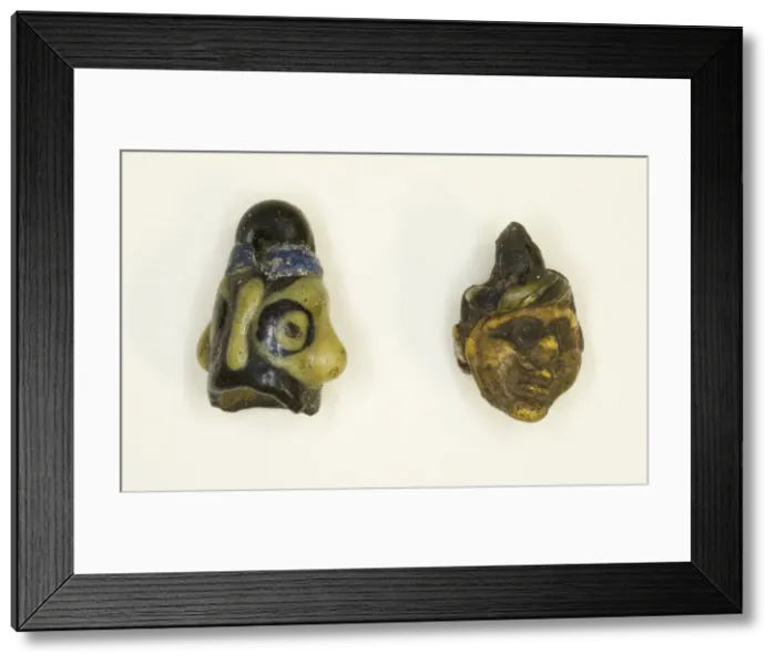 Framed Print : Head Pendants, Carthage, Roman Period (30 BC-395 AD). Creator: Unknown Framed Print : Head Pendants, Carthage, Roman Period (30 BC-395 AD). Creator: Unknown