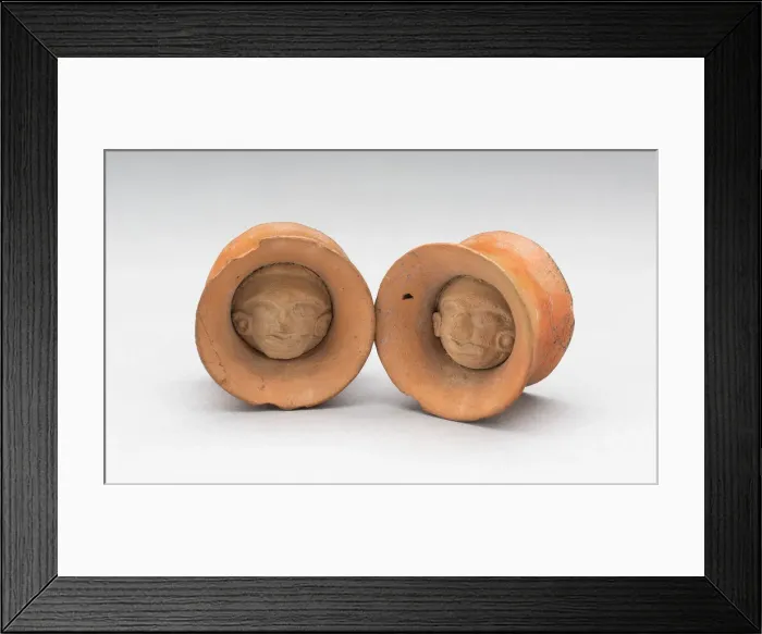 Framed Print : Pair of Earspools with Face in Interior, Possibly AD 450 / 1000. Creator: Unknown Framed Print : Pair of Earspools with Face in Interior, Possibly AD 450 / 1000. Creator: Unknown