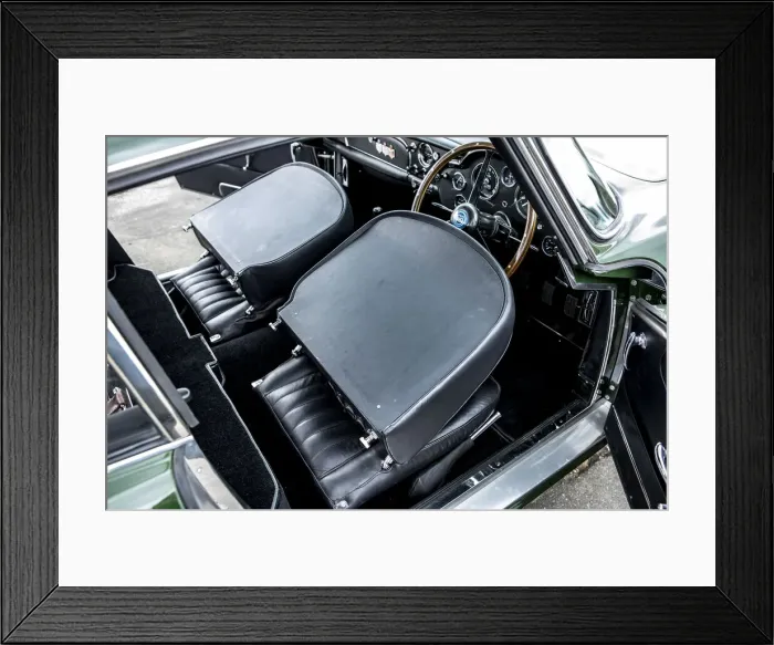 Framed Print : Folded down front seats of a 1961 Aston Martin DB4 GT previously owned by Donald Campbell Framed Print : Folded down front seats of a 1961 Aston Martin DB4 GT previously owned by Donald Campbell