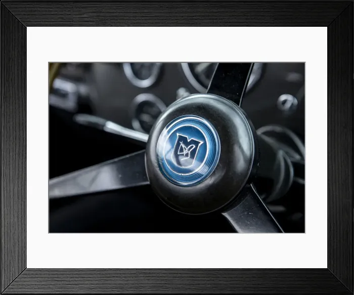 Framed Print : Steering wheel boss of a 1961 Aston Martin DB4 GT previously owned by Donald Campbell Framed Print : Steering wheel boss of a 1961 Aston Martin DB4 GT previously owned by Donald Campbell