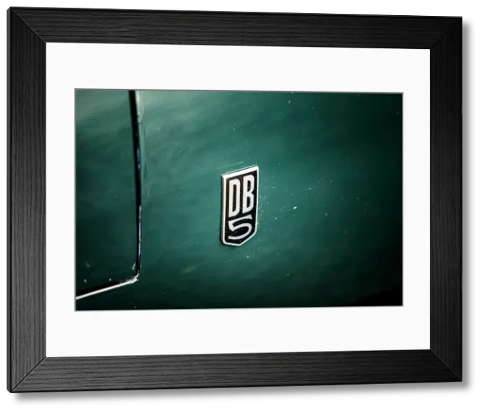 Framed Print : Badge of a 1965 Aston Martin DB5. Creator: Unknown Framed Print : Badge of a 1965 Aston Martin DB5. Creator: Unknown