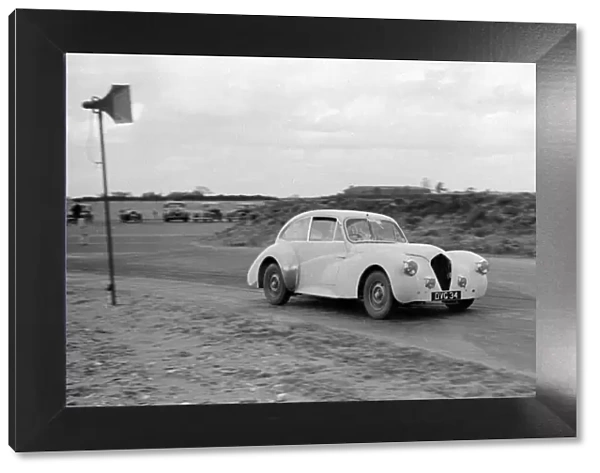 Ray Playford driving a Healey Elliott, at Snetterton Circuit, Norfolk, 1953
