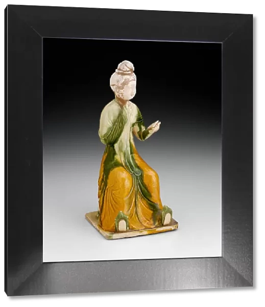 Seated Woman Holding Mirror, Tang dynasty (A. D. 618-907), first half of 8th century