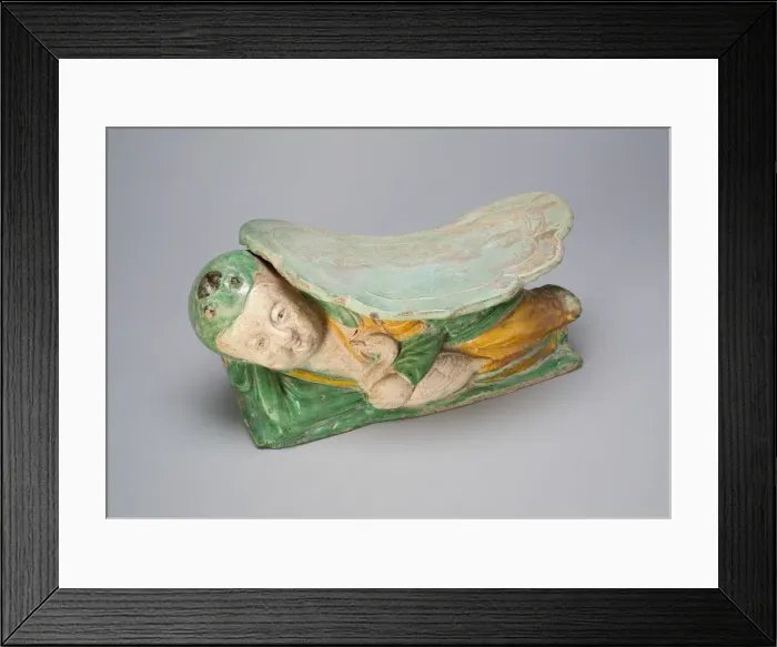 Framed Print : Pillow with Boy Supporting a Cloud-Shaped Headrest, Jin dynasty (1115-1234) Framed Print : Pillow with Boy Supporting a Cloud-Shaped Headrest, Jin dynasty (1115-1234)