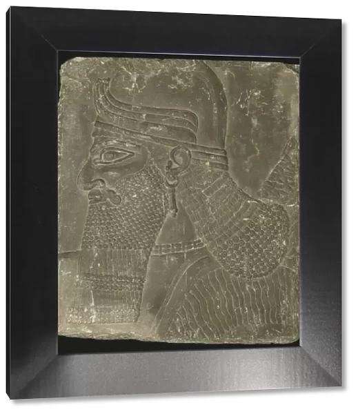 Relief Showing the Head of a Winged Genius, Neo-Assyrian Period