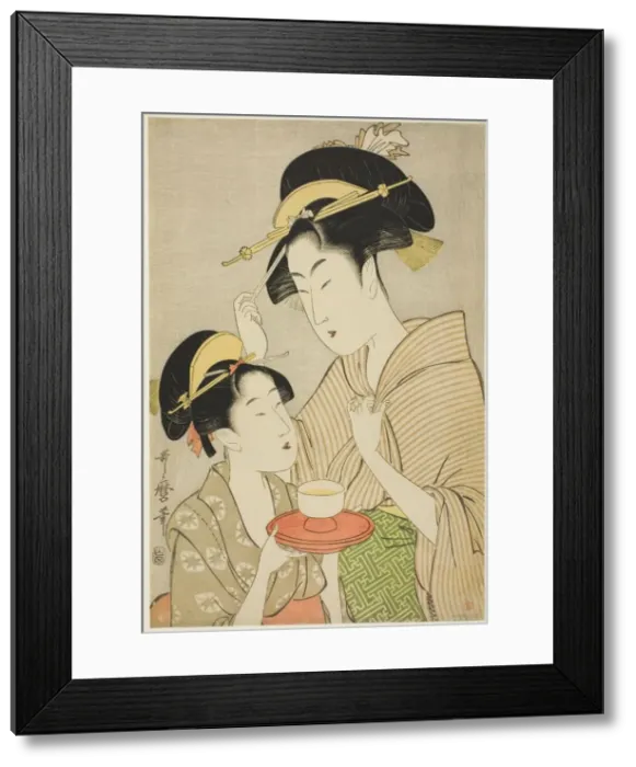 Framed Print : A Young Girl Offering Tea to Another Woman, Japan, c. 1797. Creator: Kitagawa Utamaro Framed Print : A Young Girl Offering Tea to Another Woman, Japan, c. 1797. Creator: Kitagawa Utamaro