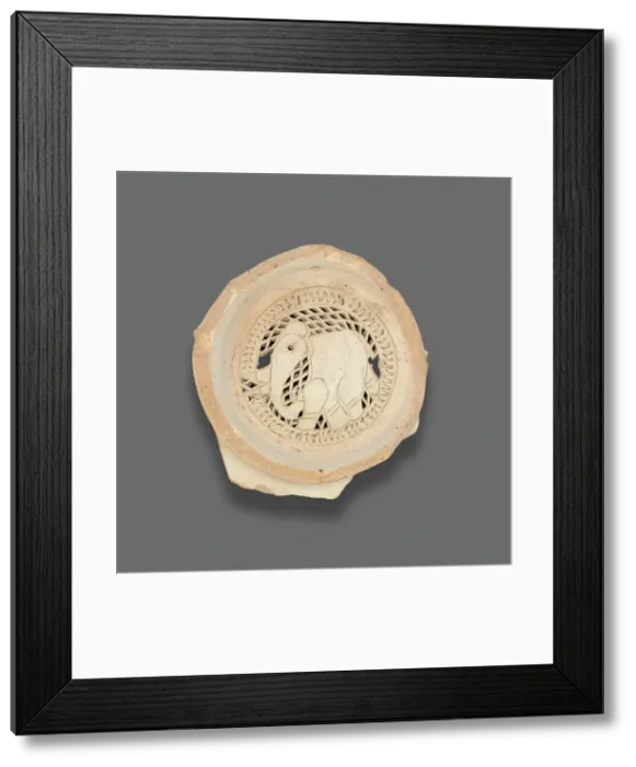 Framed Print : Clay filter with design of elephant, Fatimid dynasty (969-1171), 11th-12th century. Creator: Unknown Framed Print : Clay filter with design of elephant, Fatimid dynasty (969-1171), 11th-12th century. Creator: Unknown