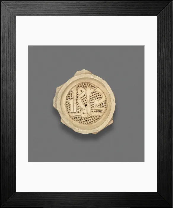 Framed Print : Clay filter with calligraphic design, Fatimid dynasty (969-1171), 11th-12th century. Creator: Unknown Framed Print : Clay filter with calligraphic design, Fatimid dynasty (969-1171), 11th-12th century. Creator: Unknown