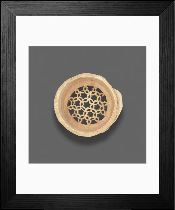 Framed Print : Clay filter with geometric design, Fatimid dynasty (969-1171), 11th-12th century. Creator: Unknown Framed Print : Clay filter with geometric design, Fatimid dynasty (969-1171), 11th-12th century. Creator: Unknown