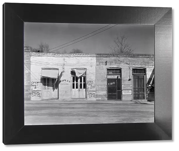 Main street storefronts, Edwards, Mississippi, 1936. Creator: Walker Evans