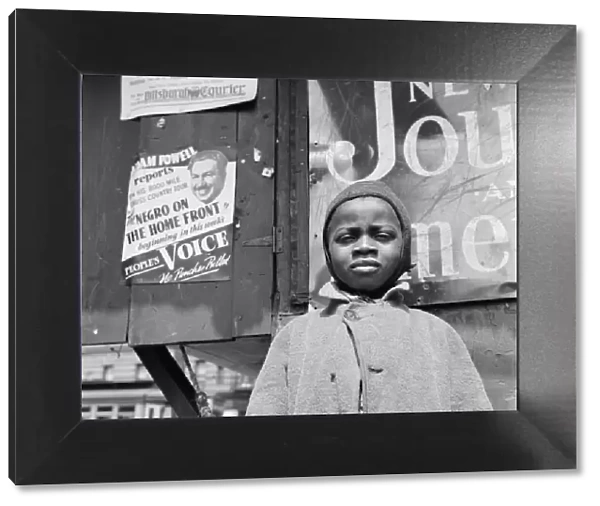 A Harlem newsboy, New York, 1943. Creator: Gordon Parks
