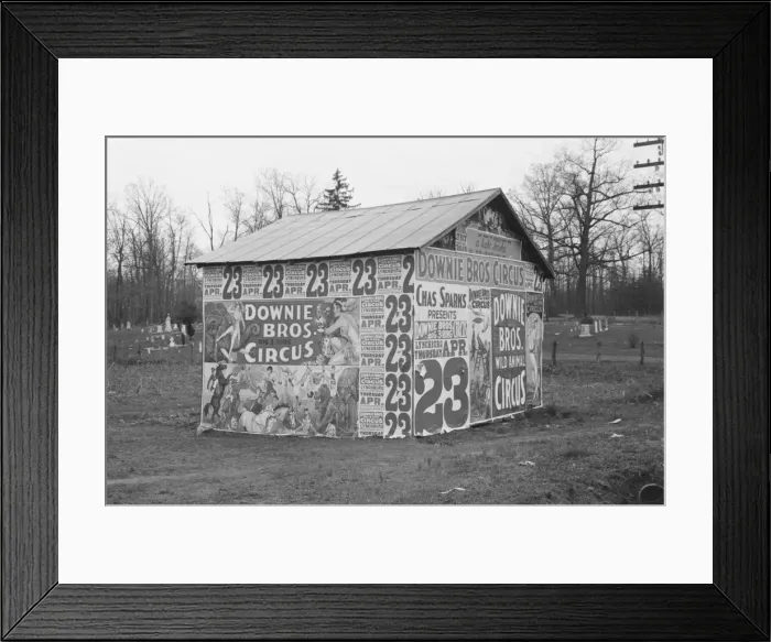 Framed Print : Posters covering a building near Lynchburg to advertise a Downie Bros. circus, 1936. Creator: Walker Evans Framed Print : Posters covering a building near Lynchburg to advertise a Downie Bros. circus, 1936. Creator: Walker Evans