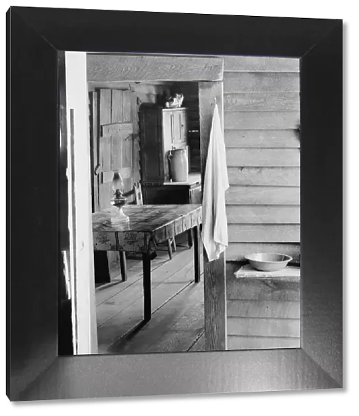 Washstand in the dog run and kitchen of Floyd Burroughs cabin, Hale County, Alabama, 1936. Creator: Walker Evans