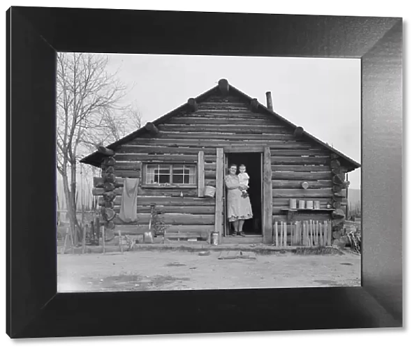 Log house now occupied and enlarged by the Halley family, Bonner County, Idaho, 1939. Creator: Dorothea Lange