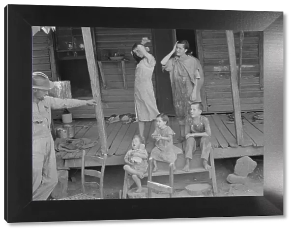 Floyd Burroughs and Tengle children, Hale County, Alabama, 1936. Creator: Walker Evans