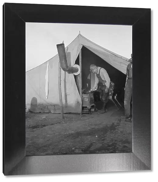 In a carrot pullers camp near Holtville, California, 1939. Creator: Dorothea Lange