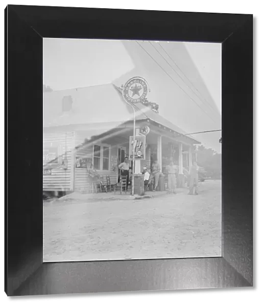 Rural filling station becomes community... 4 July, near Chapel Hill, North Carolina, 1939 Creator: Dorothea Lange